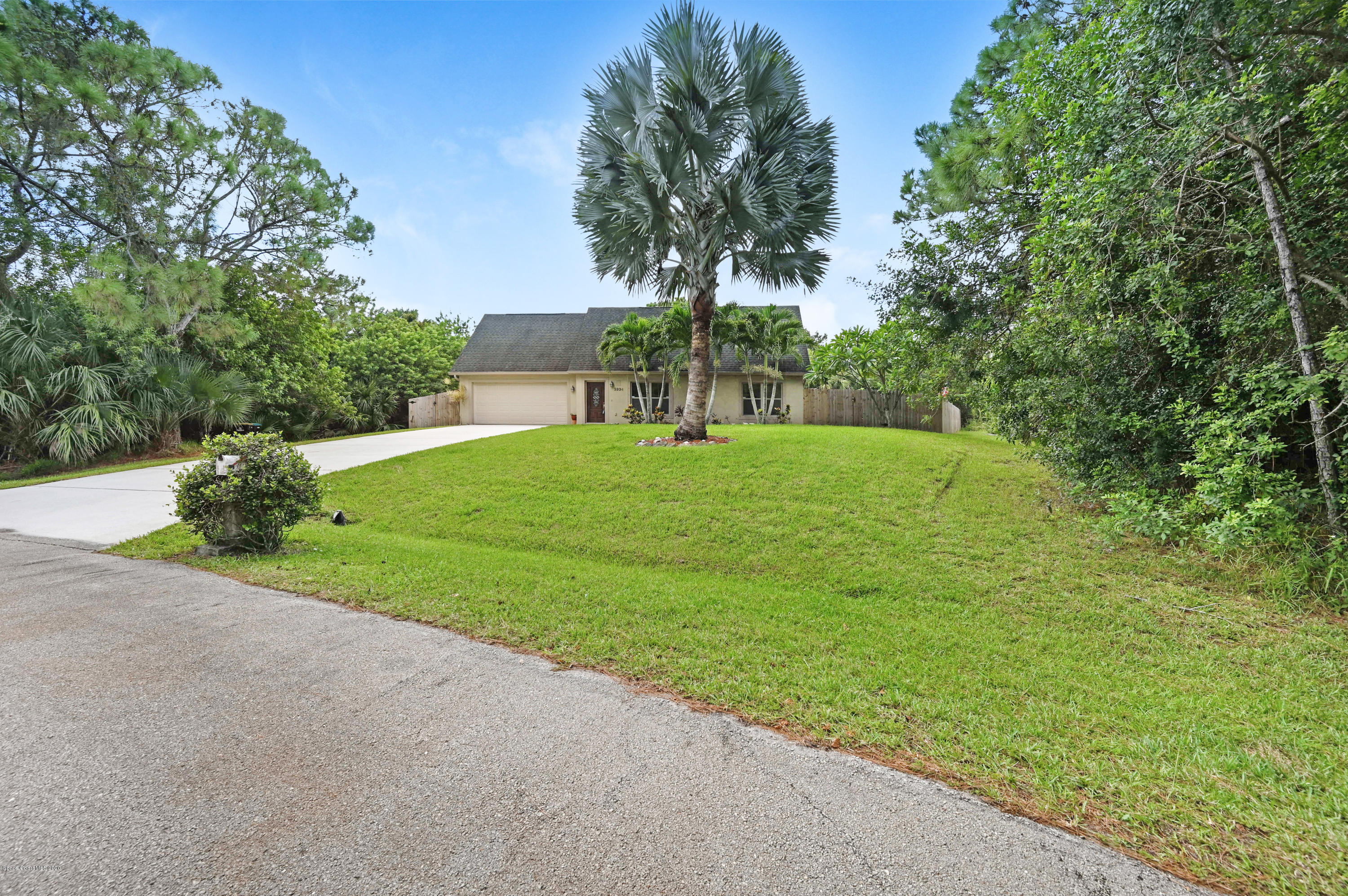 2334 Ravel Road Southeast Palm Bay, FL 32909 - Photo 33 of 34 Turn Right at the Beautiful Silver Palm!