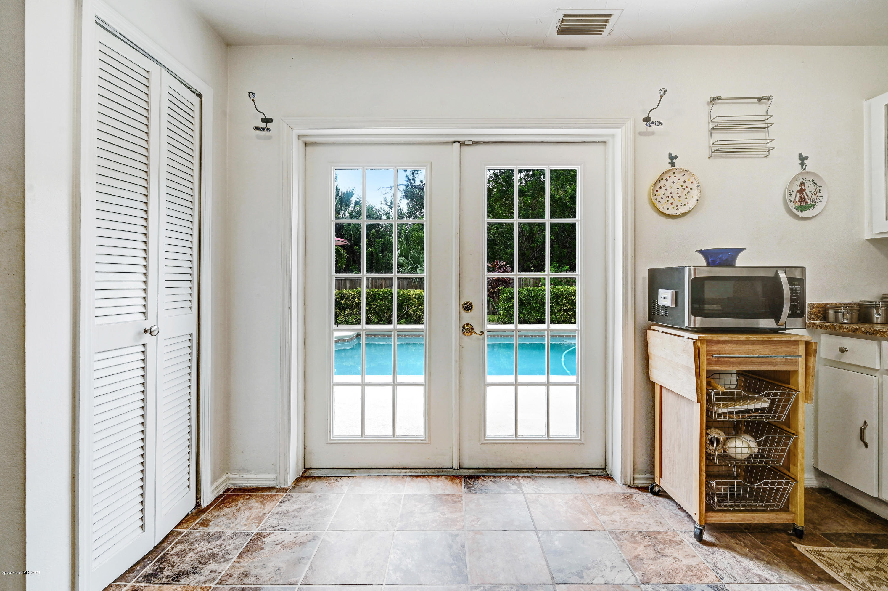 2334 Ravel Road Southeast Palm Bay, FL 32909 - Photo 9 of 34 Pool View from the French Doors!