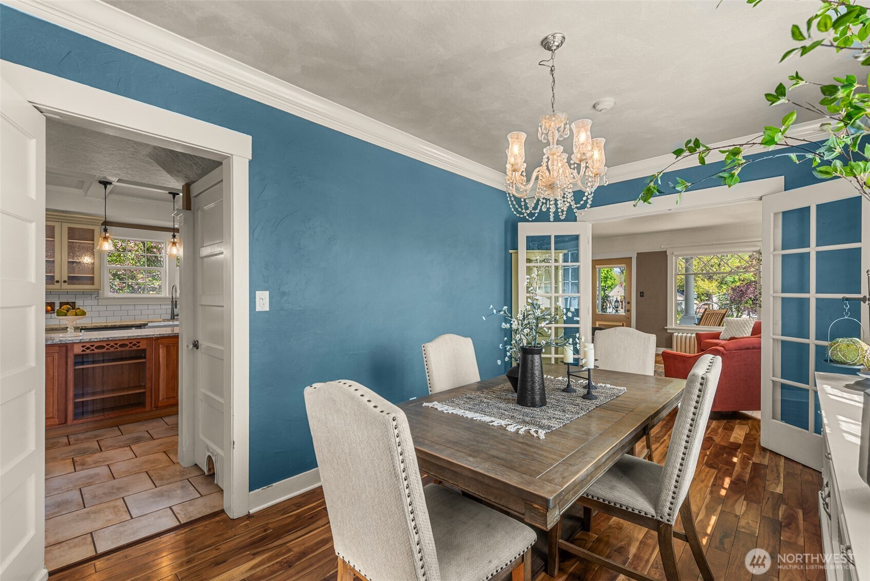 1133 Washington Street Wenatchee, WA 98801 - Photo 18 of 40 a view of a dining room with furniture wooden floor and chandelier