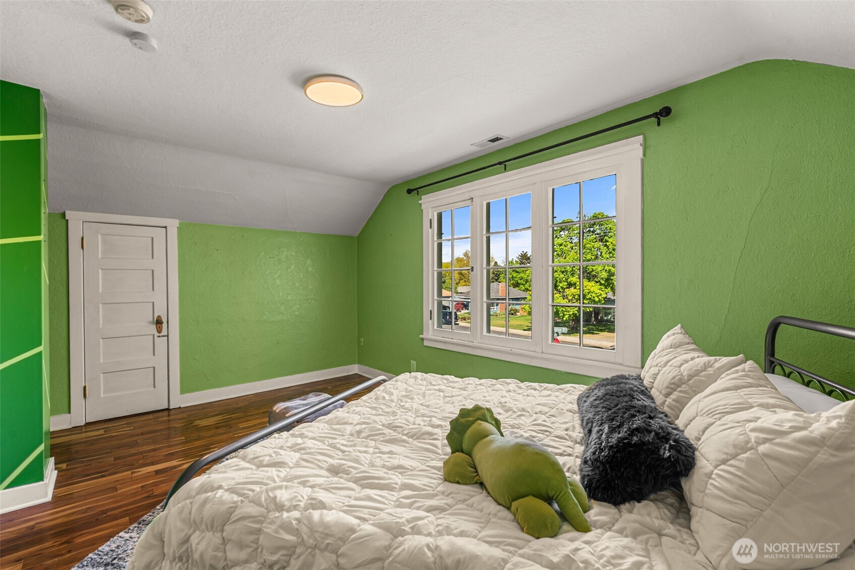 1133 Washington Street Wenatchee, WA 98801 - Photo 26 of 40 a bedroom with a bed and a large window