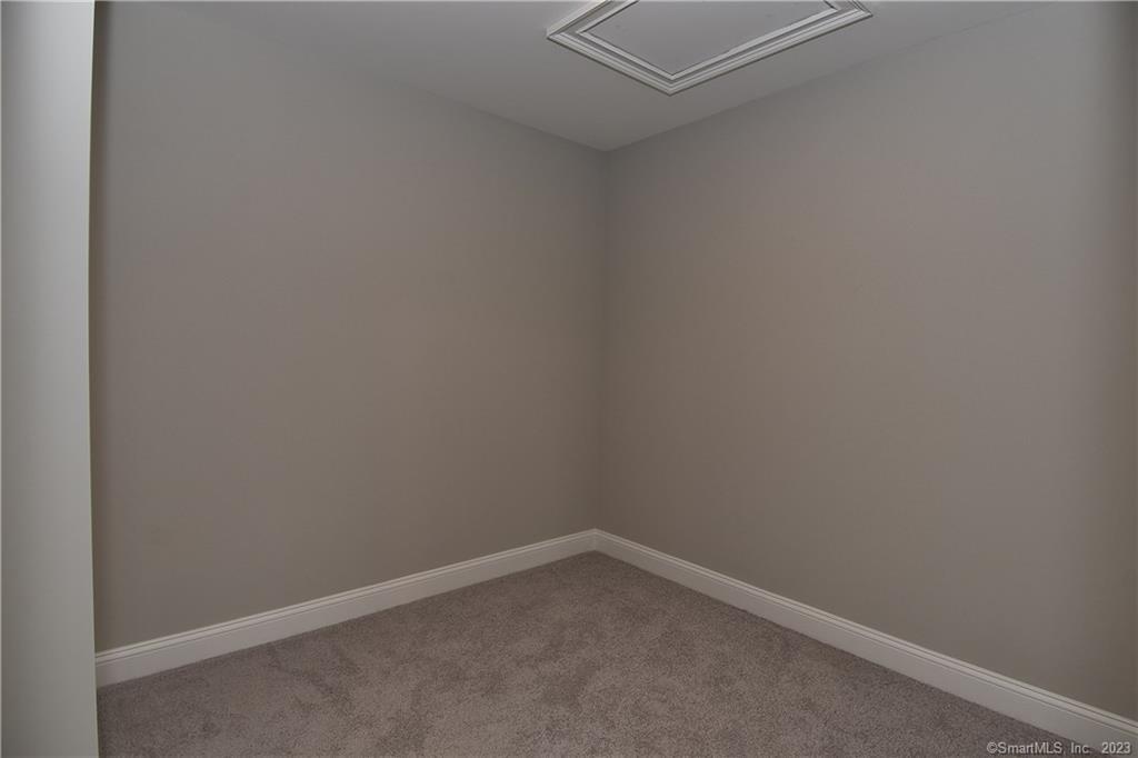 46 Village Crossing, Unit 46 Niantic, CT 06357 - Photo 12 of 24 a room that has a window