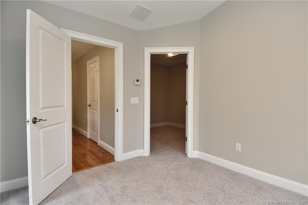 46 Village Crossing, Unit 46 Niantic, CT 06357 - Photo 14 of 24 an empty room and closet area