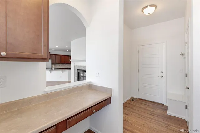 a view of a kitchen with a sink and dishwasher