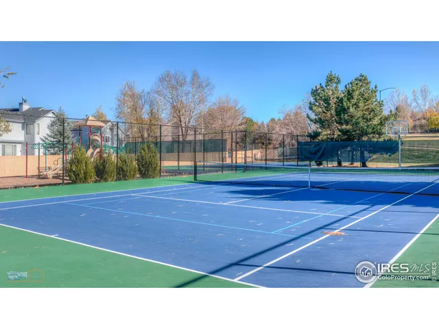a view of a city with mountains in the background