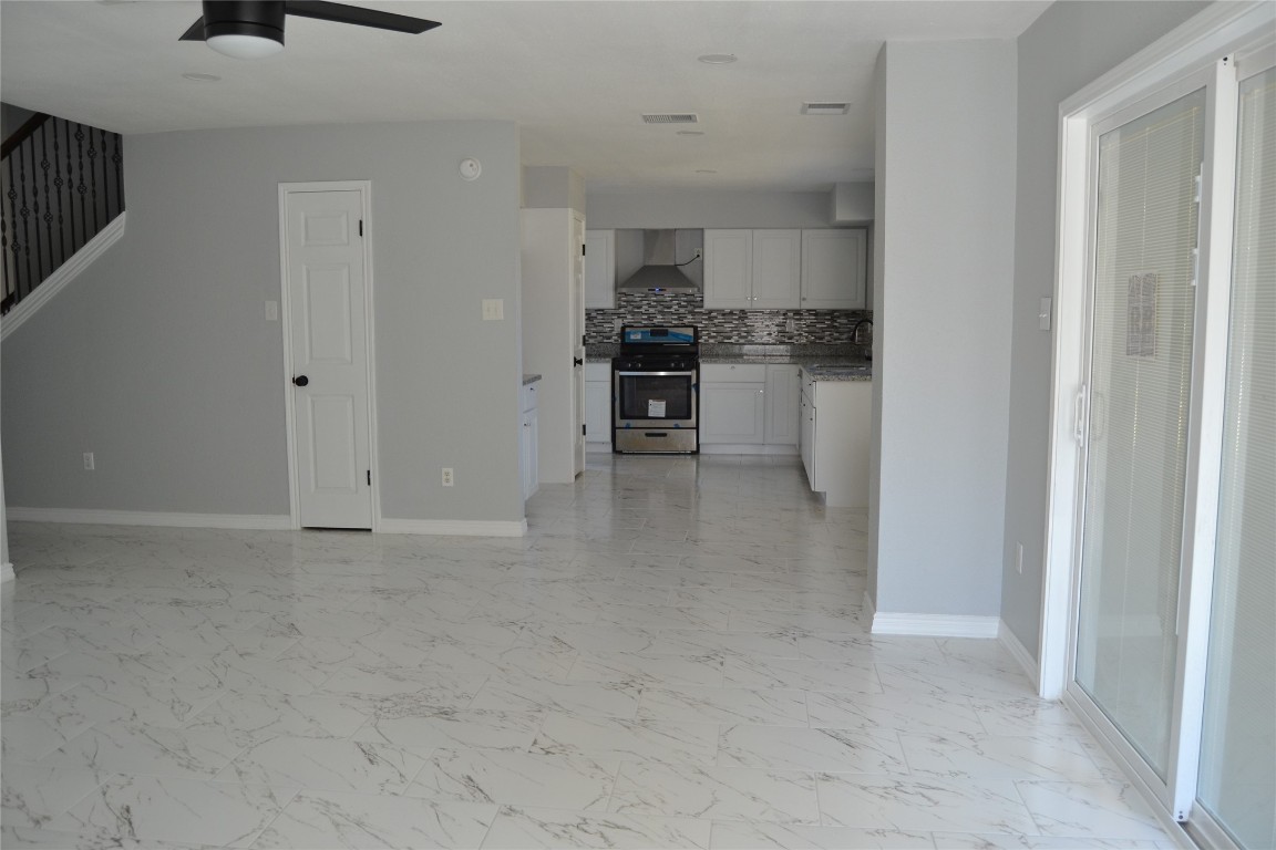 2242 Gray Hawk Lane Katy, TX 77449 - Photo 19 of 32 View of family room and kitchen