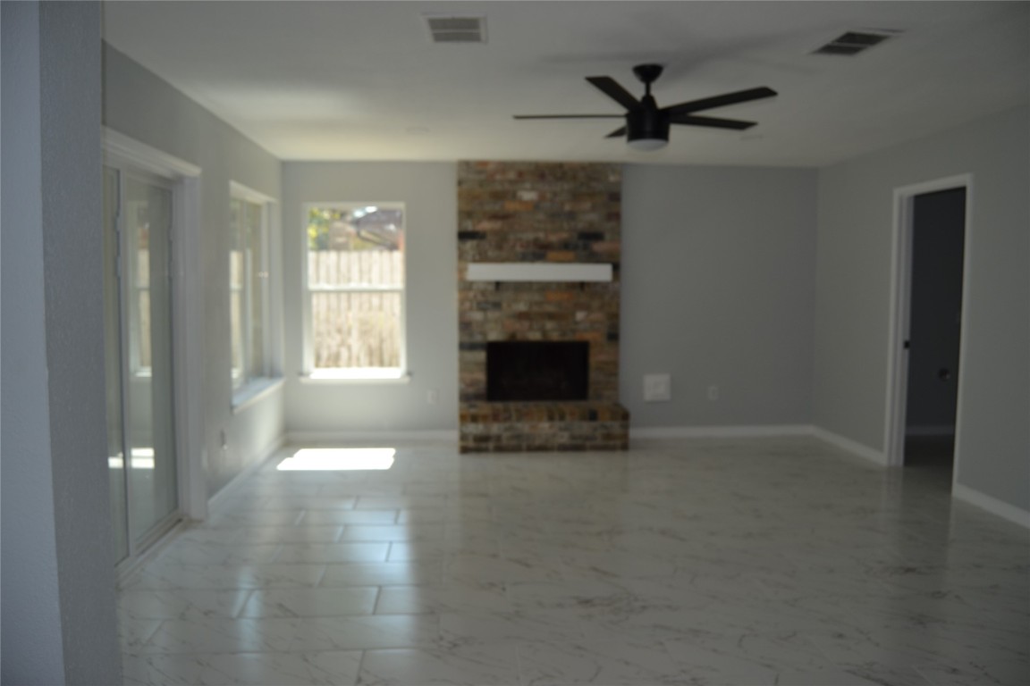 2242 Gray Hawk Lane Katy, TX 77449 - Photo 21 of 32 Gas fireplace in family room