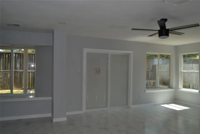 a view of gallery with windows