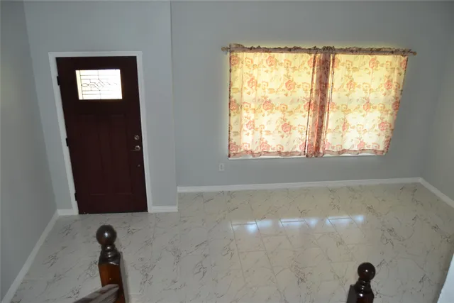 a view of a bath tub in a room