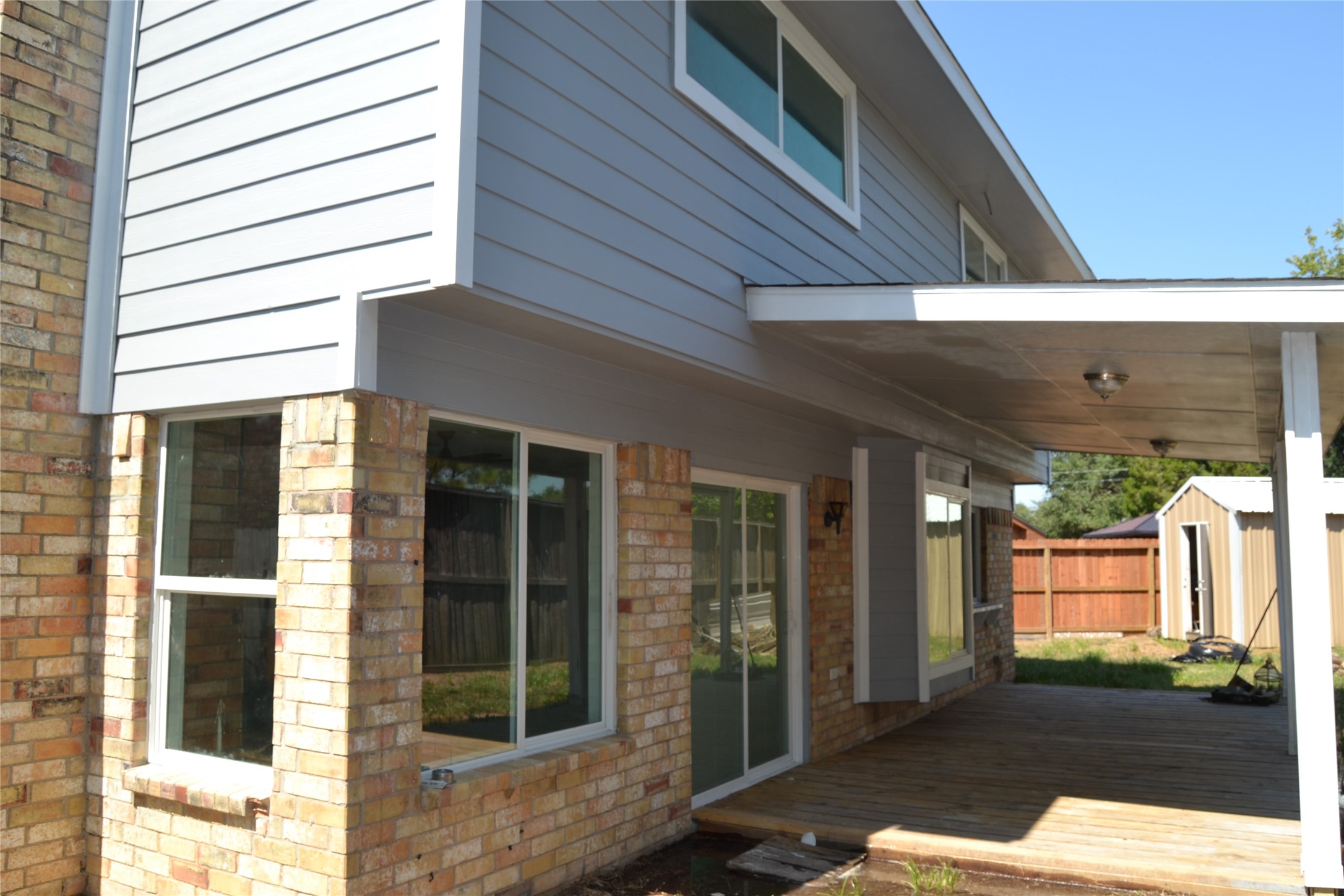2242 Gray Hawk Lane Katy, TX 77449 - Photo 32 of 32 a view of a porch with a table and chairs
