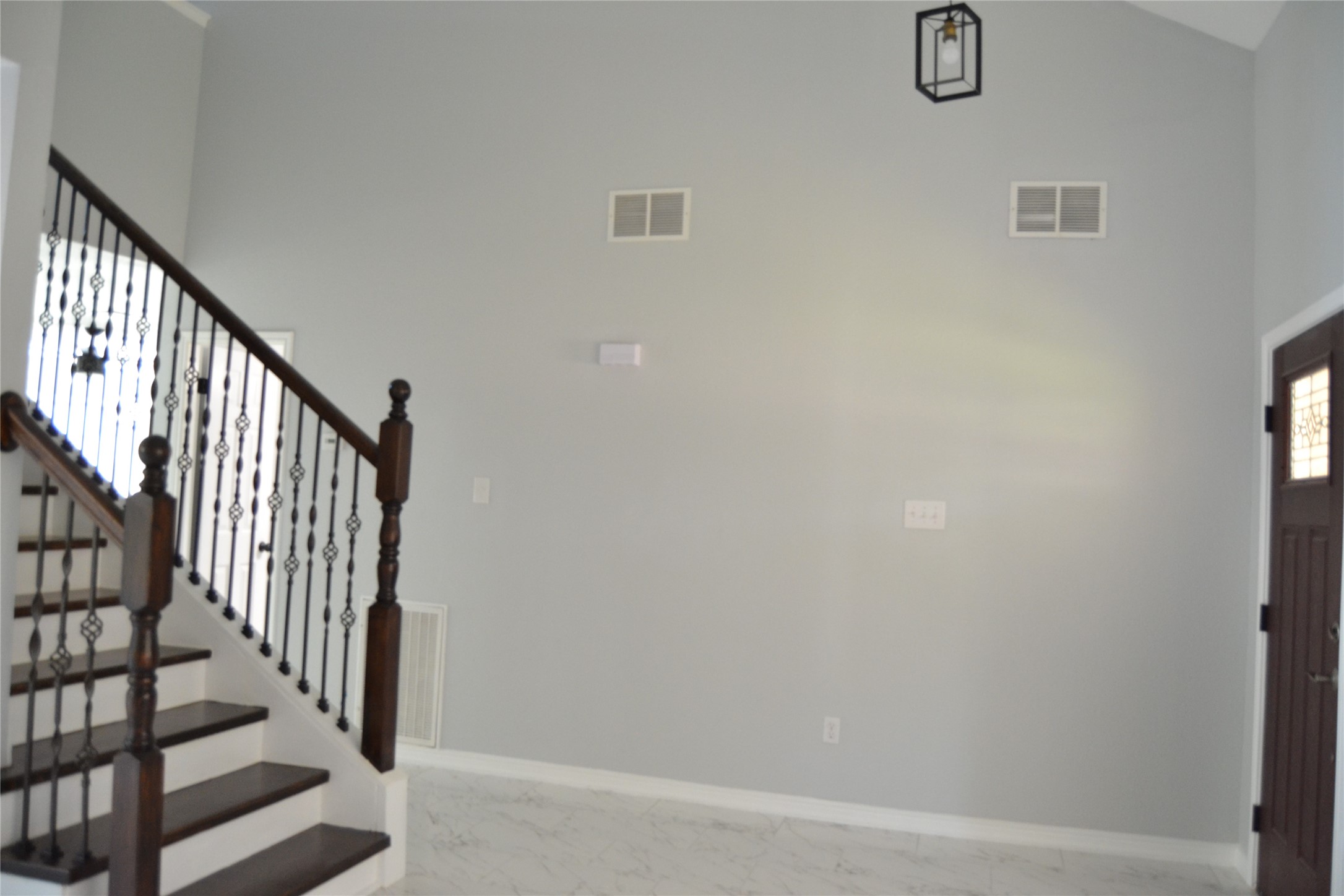2242 Gray Hawk Lane Katy, TX 77449 - Photo 7 of 32 a view of staircase with railing and white walls