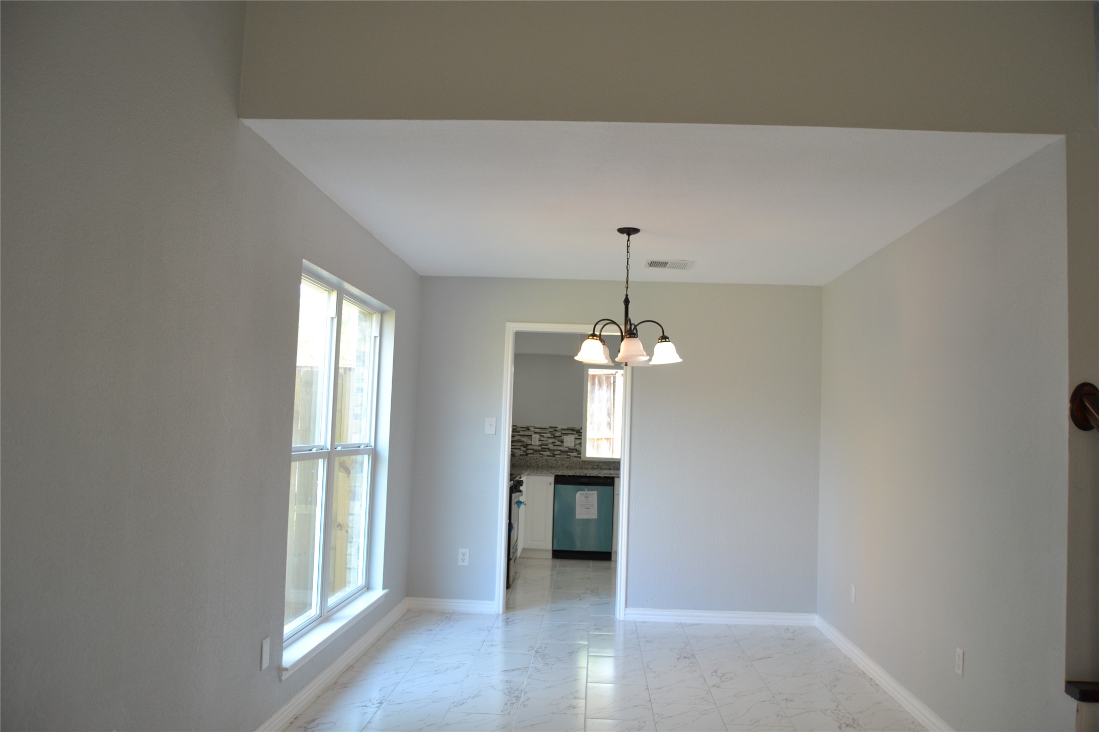 2242 Gray Hawk Lane Katy, TX 77449 - Photo 9 of 32 wooden floor in an empty room with a window