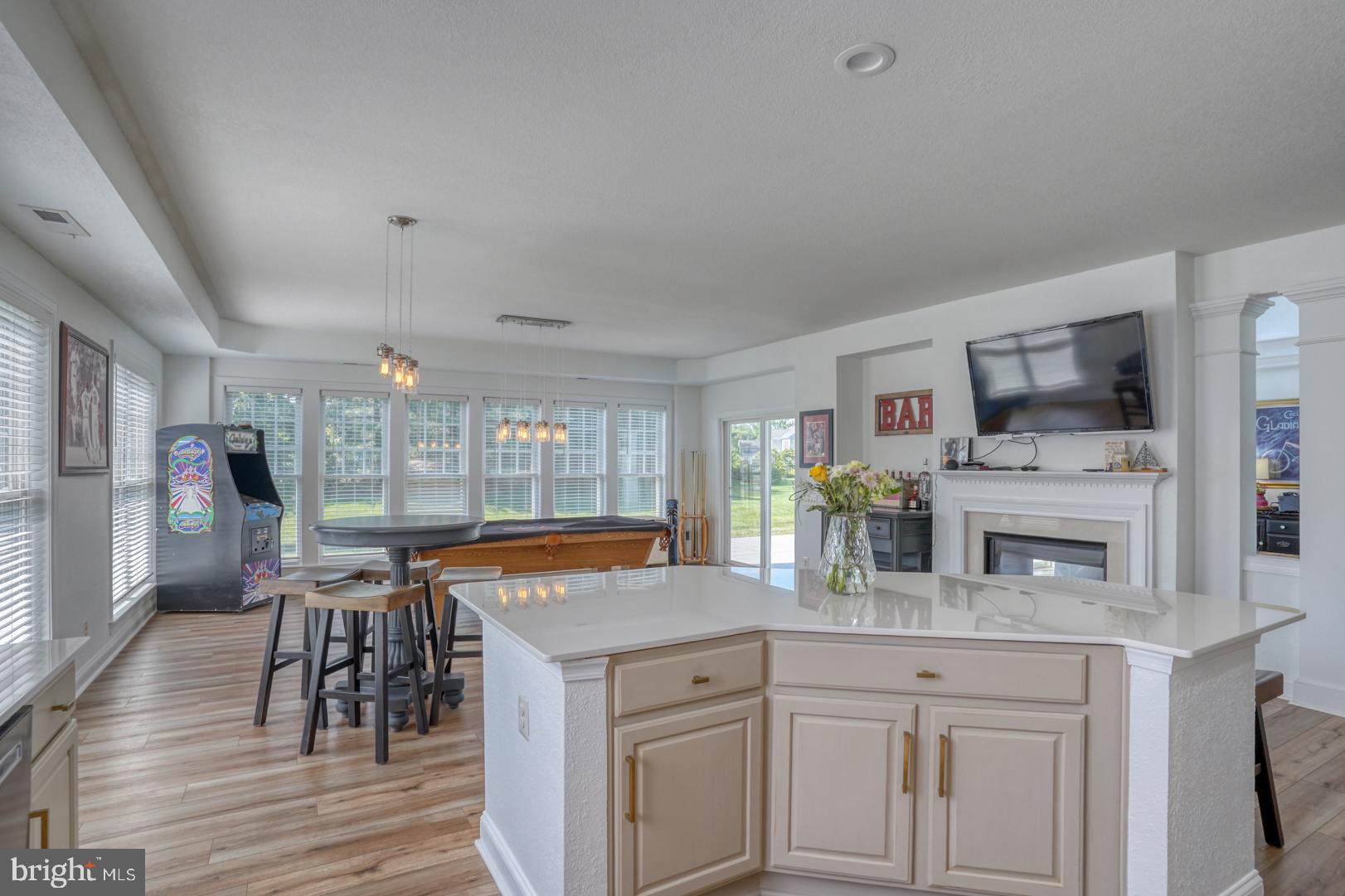 34026 Joyce Court Lewes, DE 19958 - Photo 17 of 48 a kitchen with stainless steel appliances granite countertop a stove and cabinets