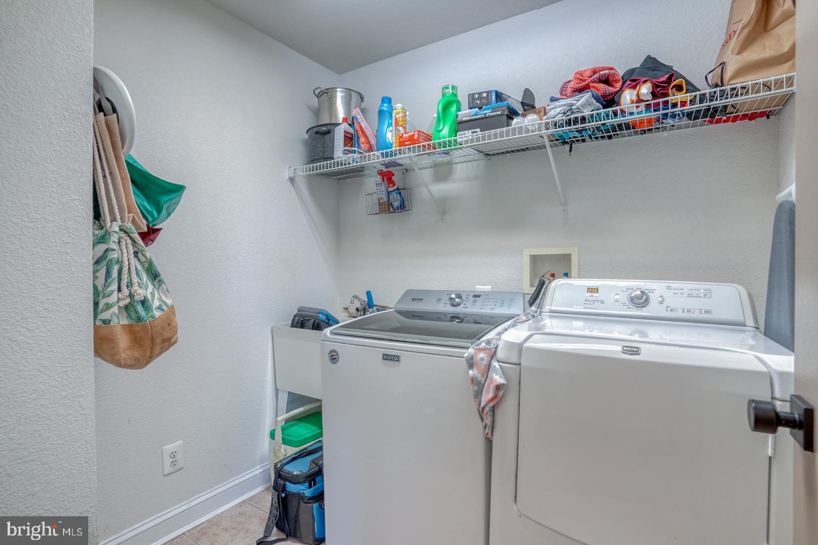 34026 Joyce Court Lewes, DE 19958 - Photo 41 of 48 a utility room with dryer and washer