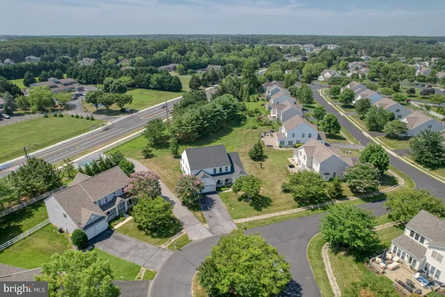 an aerial view of a house with a garden