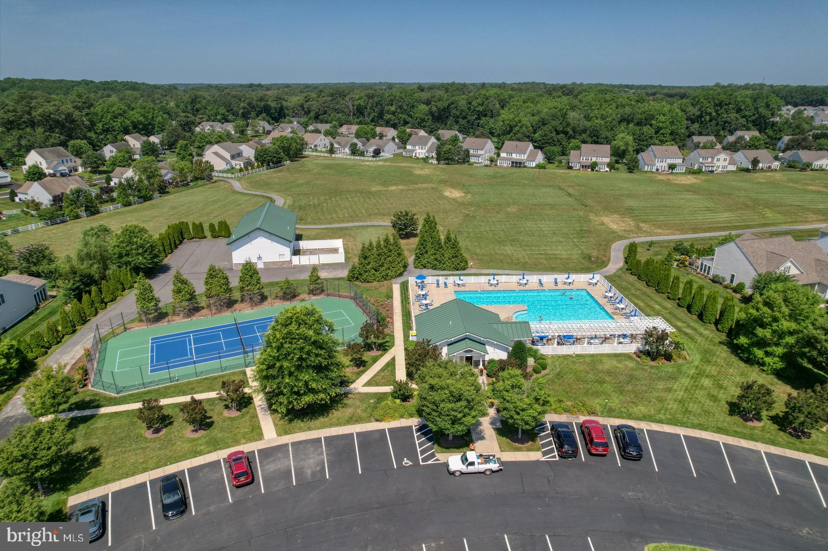 34026 Joyce Court Lewes, DE 19958 - Photo 46 of 48 an aerial view of a house with a garden and lake view
