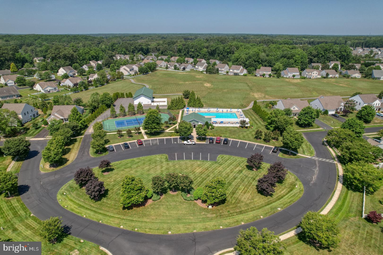 34026 Joyce Court Lewes, DE 19958 - Photo 47 of 48 a view of a lake with a house