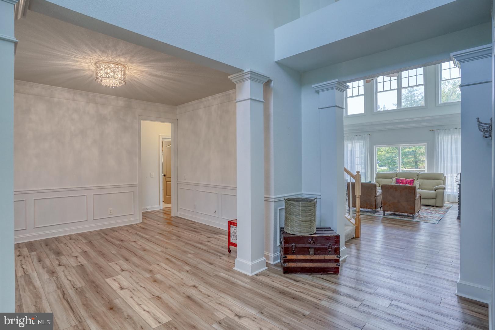 34026 Joyce Court Lewes, DE 19958 - Photo 6 of 48 a living room with furniture and wooden floor