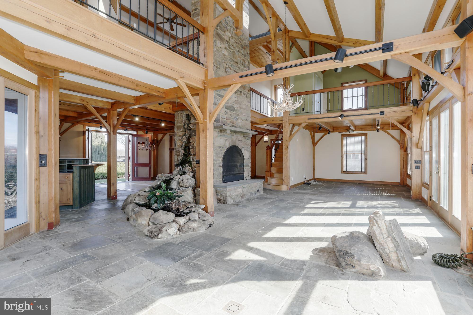 36913 Paxson Road Purcellville, VA 20132 - Photo 11 of 47 Open living area w stone fireplace