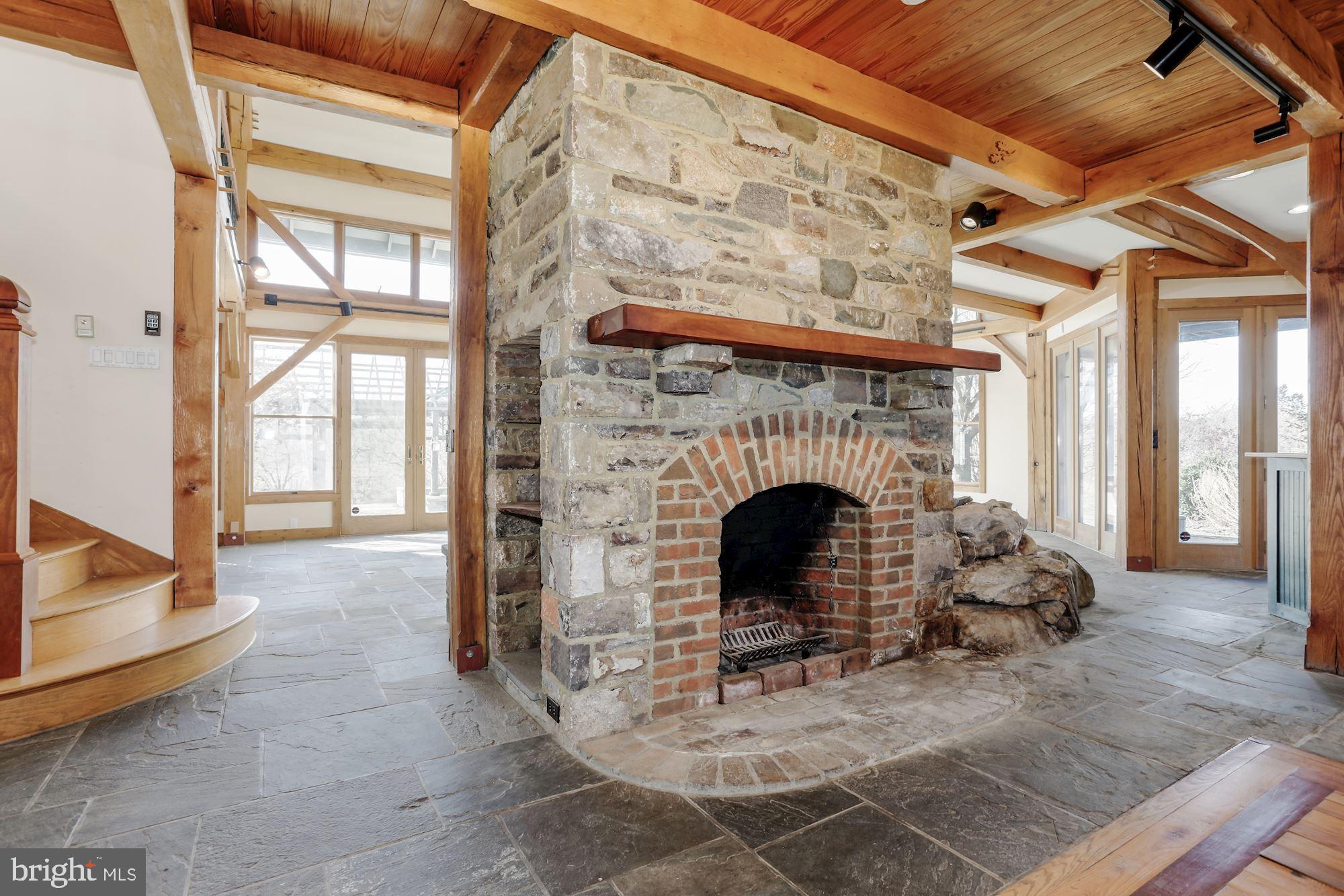 36913 Paxson Road Purcellville, VA 20132 - Photo 13 of 47 Second fireplace by dining room