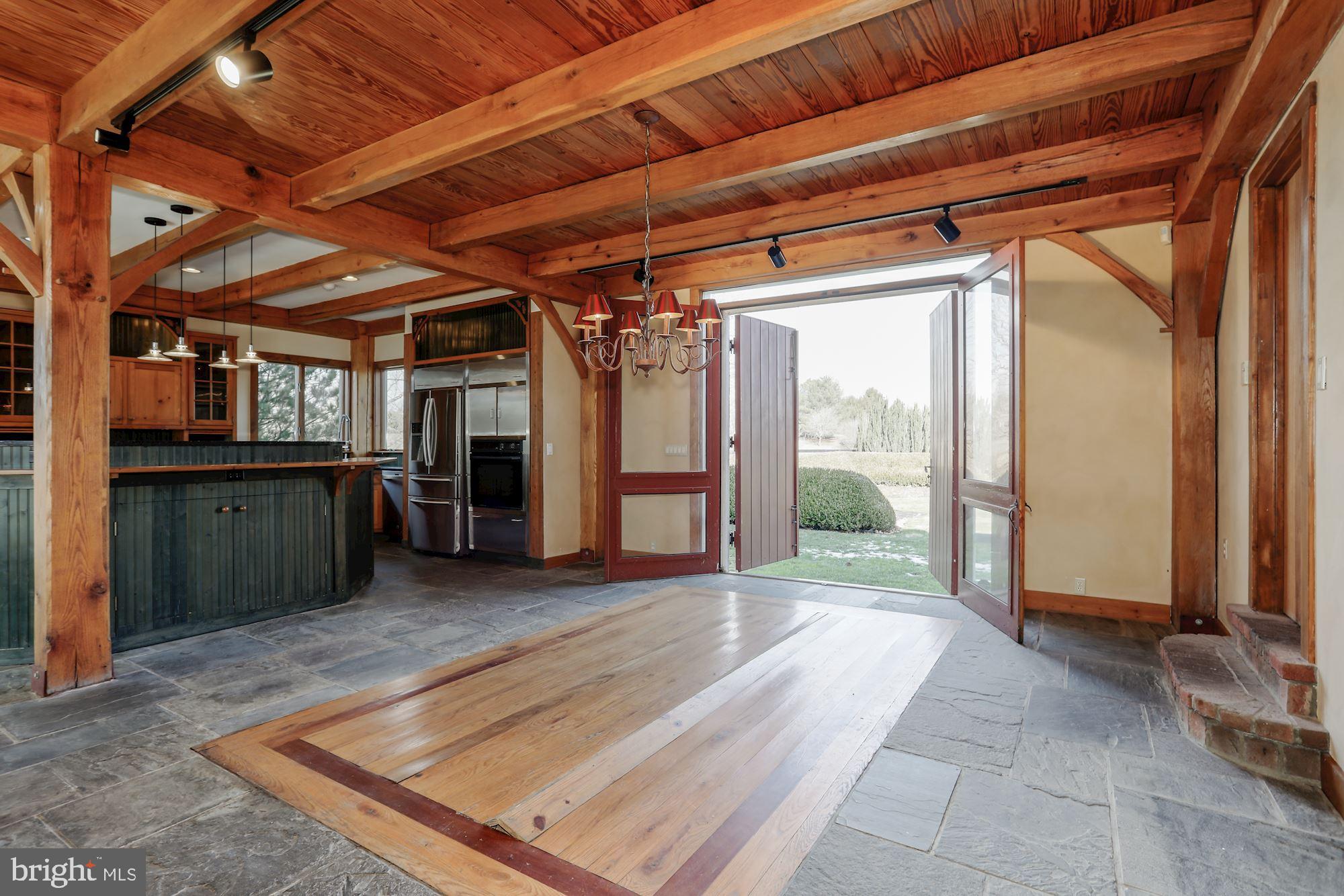 36913 Paxson Road Purcellville, VA 20132 - Photo 14 of 47 Open dining room off kitchen