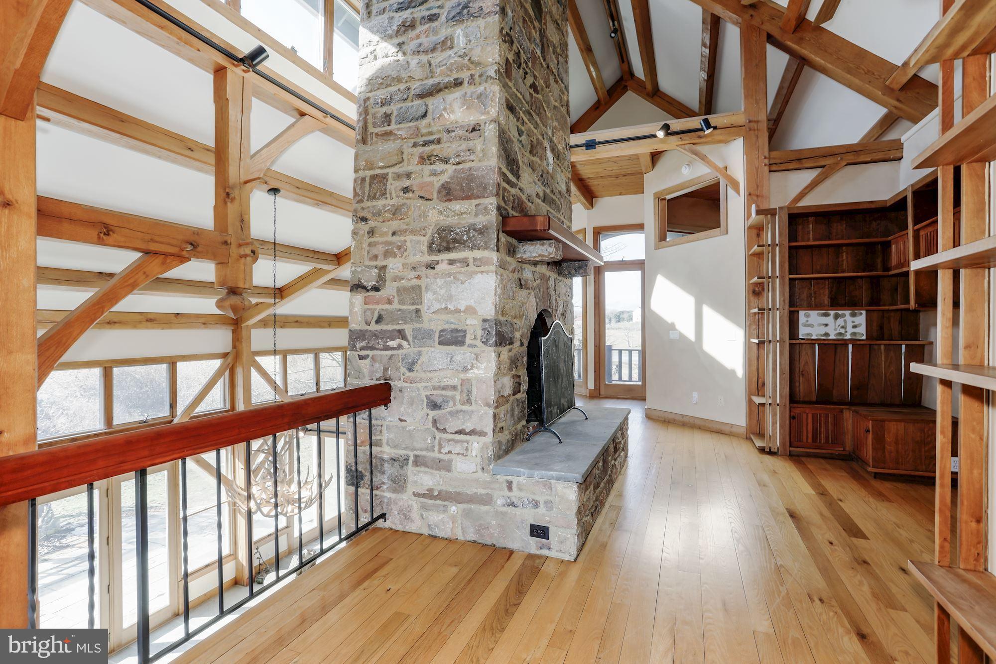 36913 Paxson Road Purcellville, VA 20132 - Photo 22 of 47 Upstairs open reading area w third fireplace