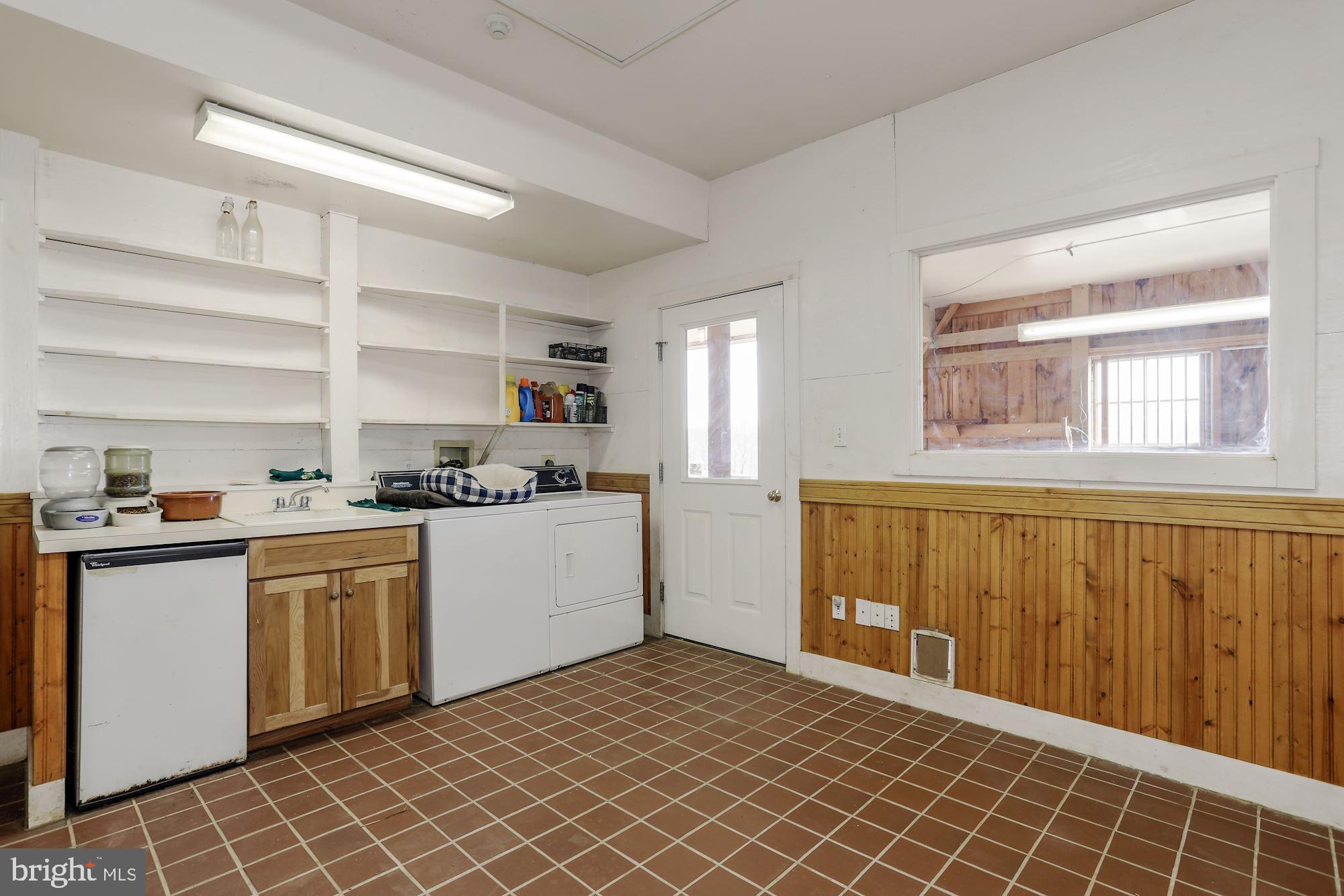 36913 Paxson Road Purcellville, VA 20132 - Photo 40 of 47 Heated tackroom with bathroom/laundry