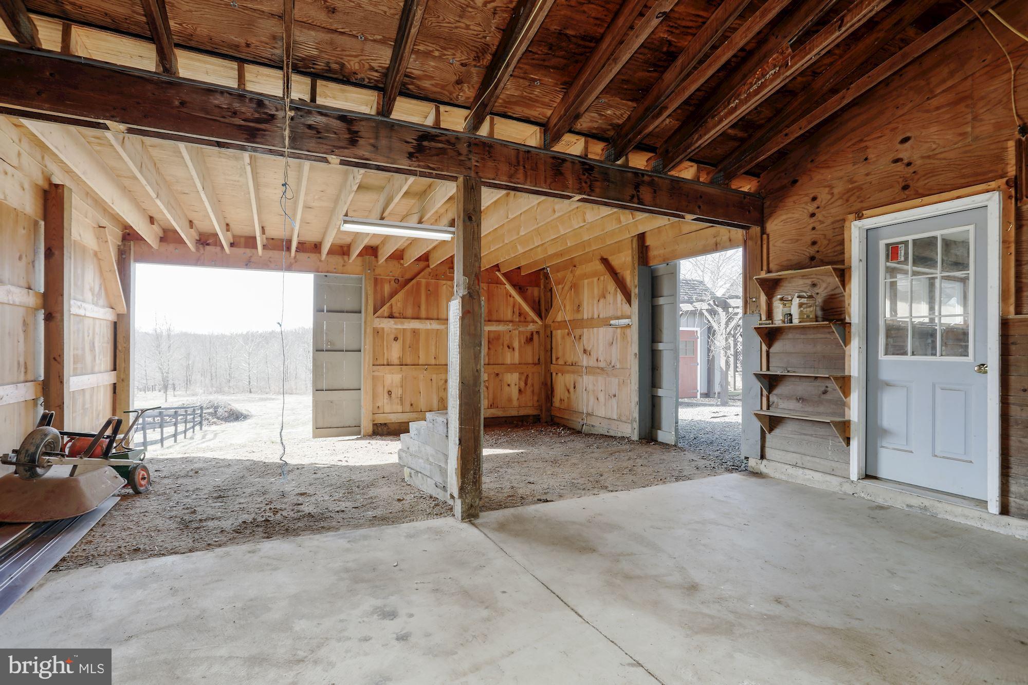 36913 Paxson Road Purcellville, VA 20132 - Photo 41 of 47 Equipment storage off of barn