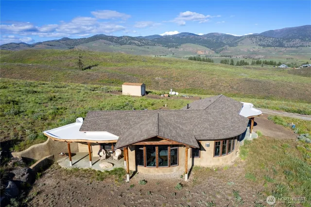a terrace with a table and chairs