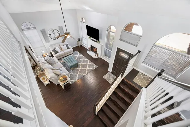 a view of living room with furniture and a window