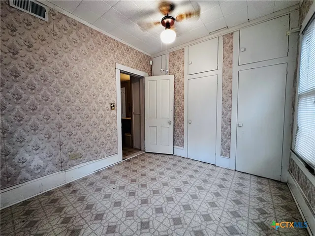 a view of a livingroom with wooden floor