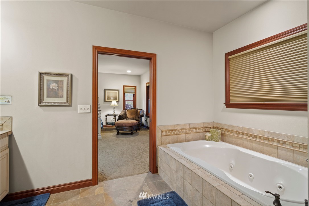 18100 Southeast 132nd Street Renton, WA 98059 - Photo 20 of 33 a bathroom with a tub and a view of bathroom
