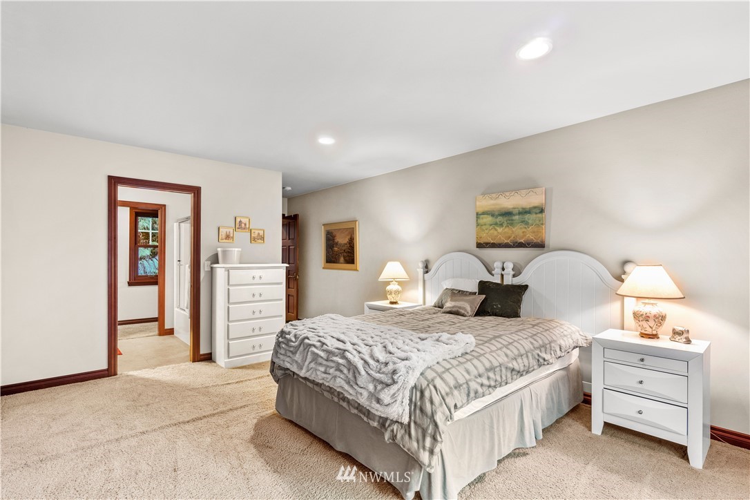 18100 Southeast 132nd Street Renton, WA 98059 - Photo 25 of 33 a bedroom with a bed and closet