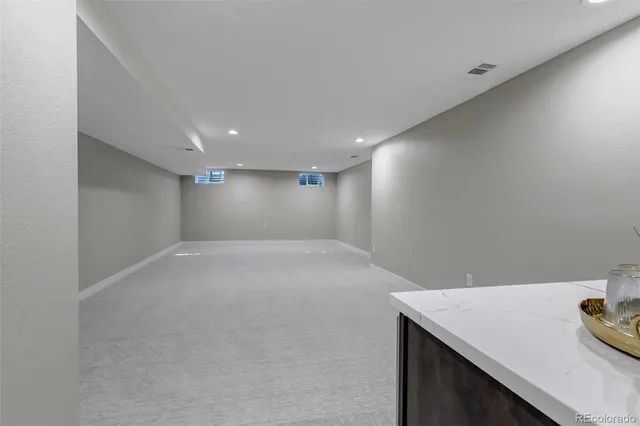 a view of storage and utility room with a sink