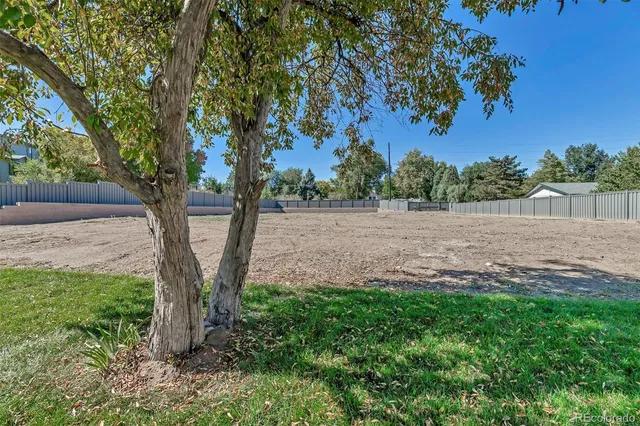 a view of backyard with outdoor space