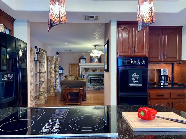 a kitchen with a stove and a sink
