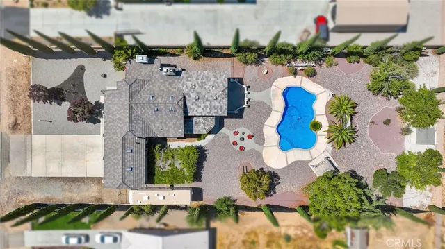 an aerial view of house with yard