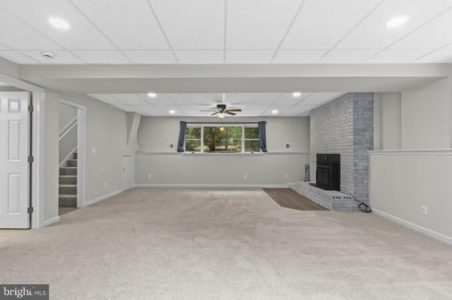 a front view of a house with a garden and porch