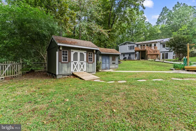 a view of lake with green space