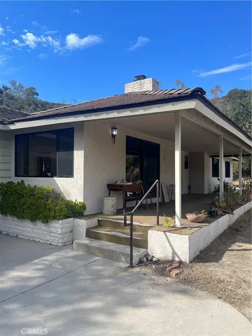 a view of a house with a patio