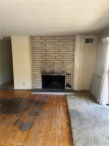 a view of pool with a yard