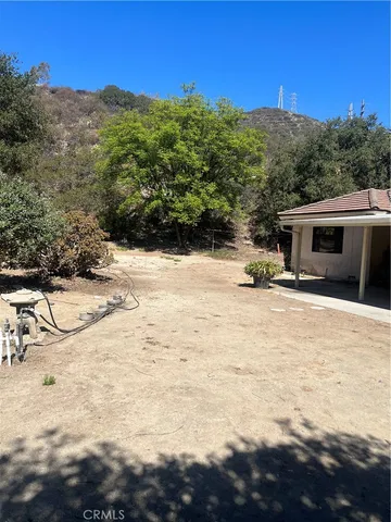 a view of a backyard with tv