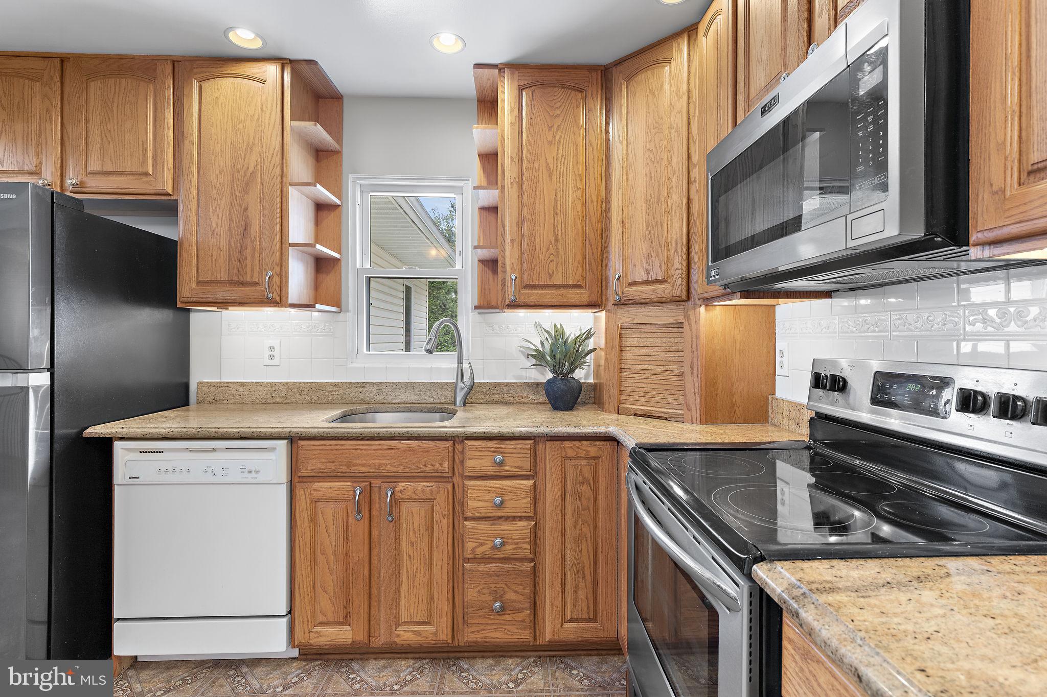 1404 Ryan Road Fallston, MD 21047 - Photo 13 of 50 Natural oak cabinetry & corner storage