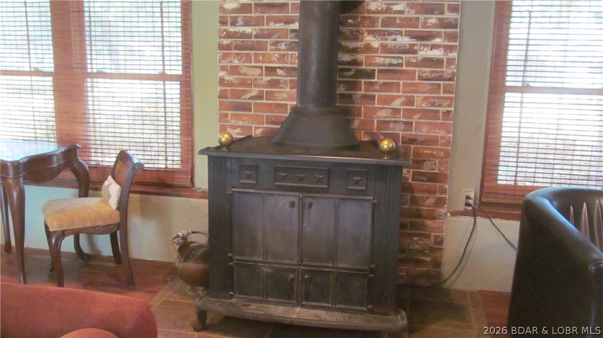 1814 Sagrada Road Edwards, MO 65326 - Photo 34 of 62 2nd FRANKLIN FIREPLACE- Enjoy heat of a wood stove