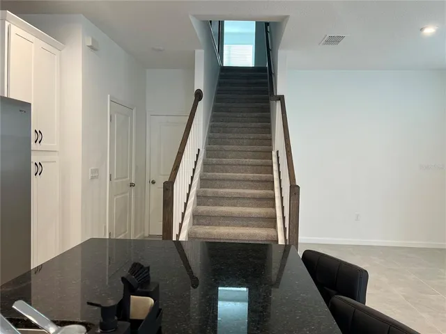 a view of a hallway with a couch
