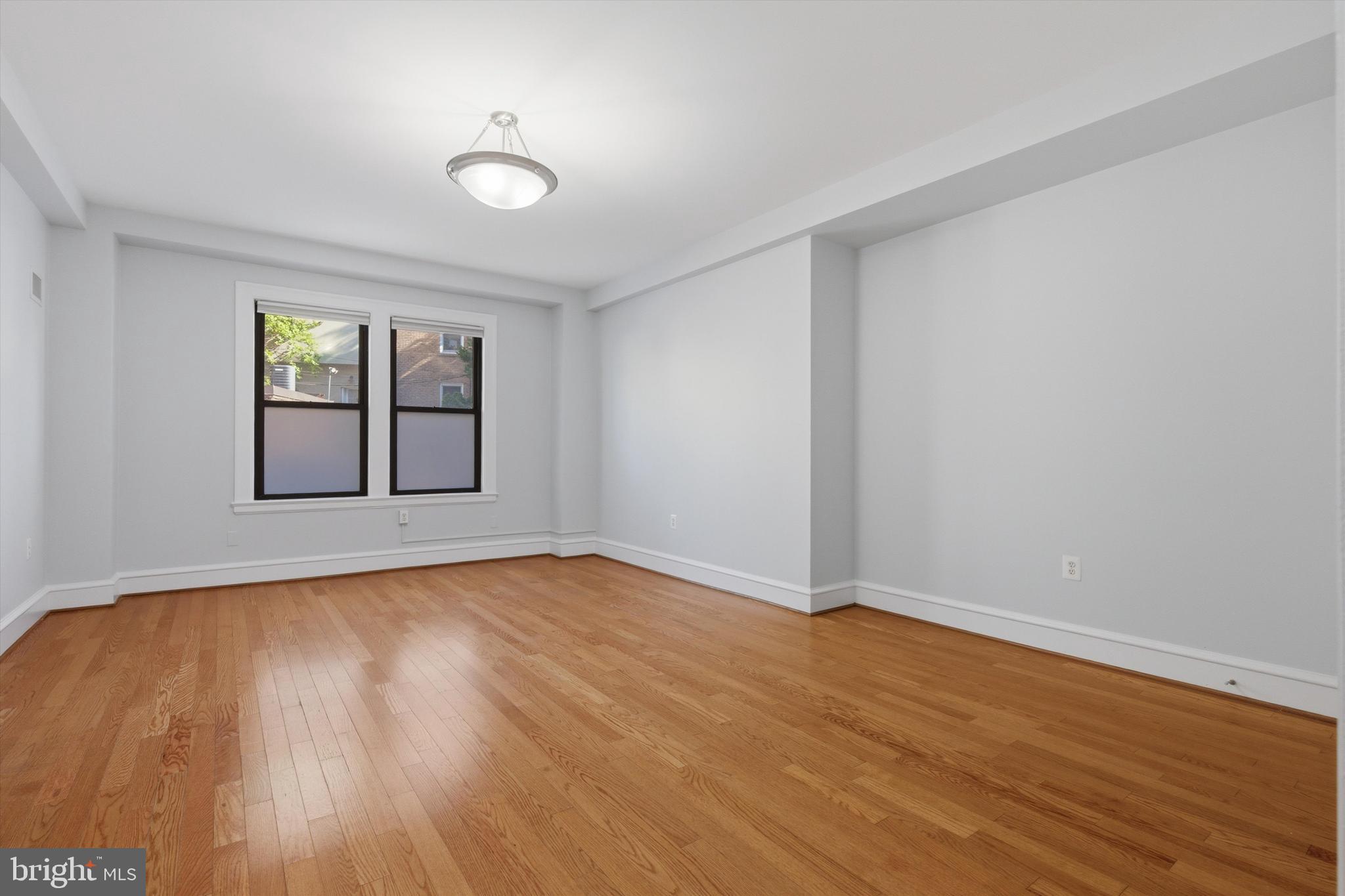 1613 Harvard Street Northwest, Unit 114 Washington, DC 20009 - Photo 4 of 22 Flexible layout for living and dining