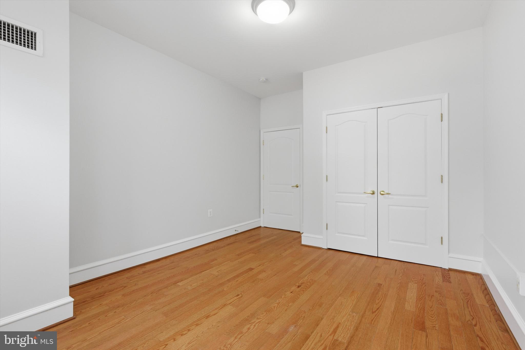 1613 Harvard Street Northwest, Unit 114 Washington, DC 20009 - Photo 10 of 22 Generously sized primary bedroom