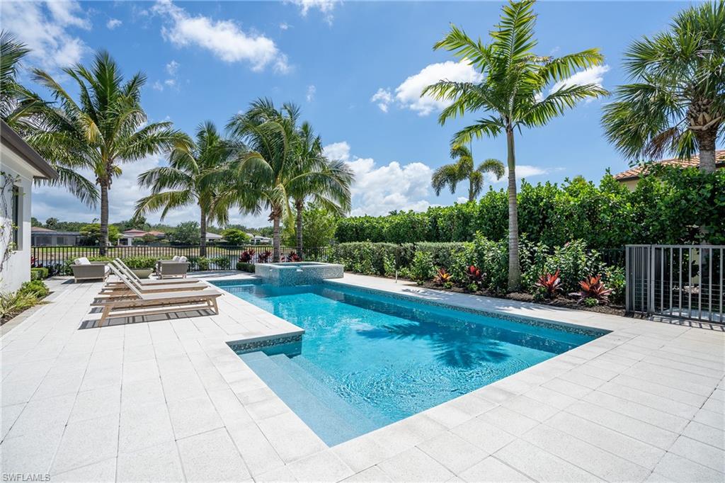 16708 Lucarno Way Naples, FL 34110 - Photo 21 of 46 a view of outdoor space with swimming pool and lounge chair