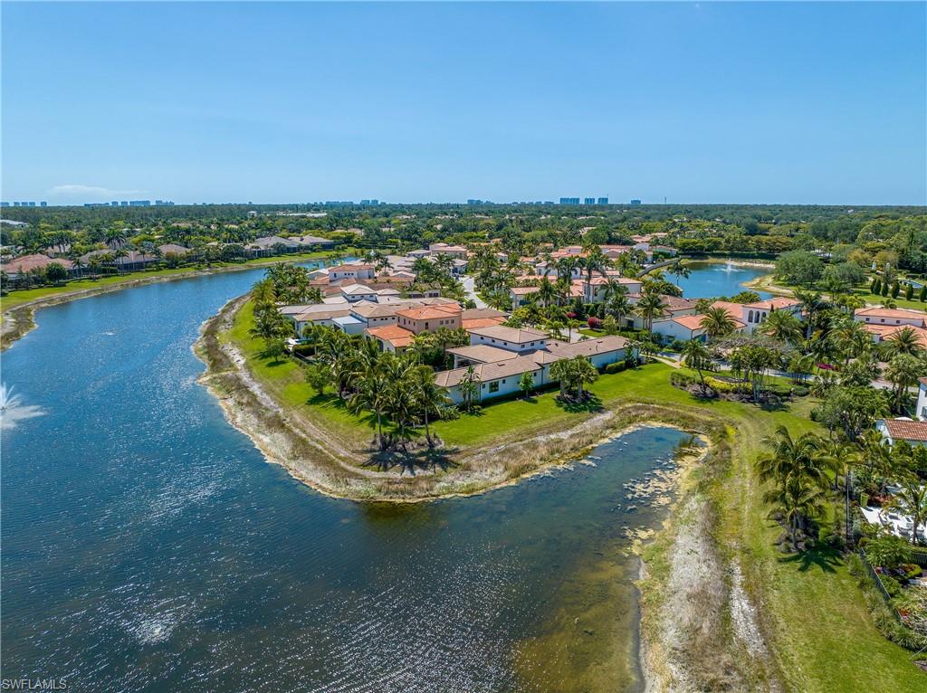 16708 Lucarno Way Naples, FL 34110 - Photo 5 of 46 an aerial view of a house with a lake view