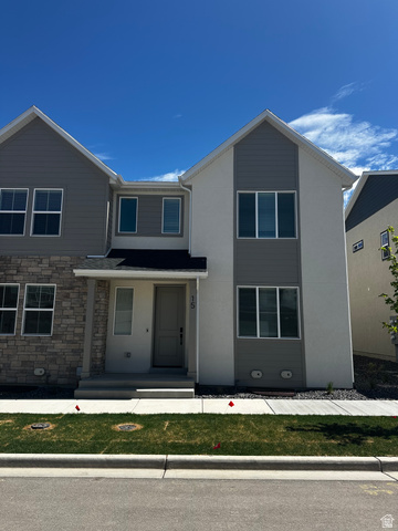 15 South Lunar Way Mapleton, UT 84664 - Photo 1 of 13 View of front facade with covered porch and stone siding