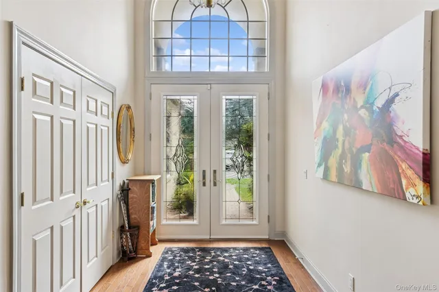 a view of a entryway with a front door